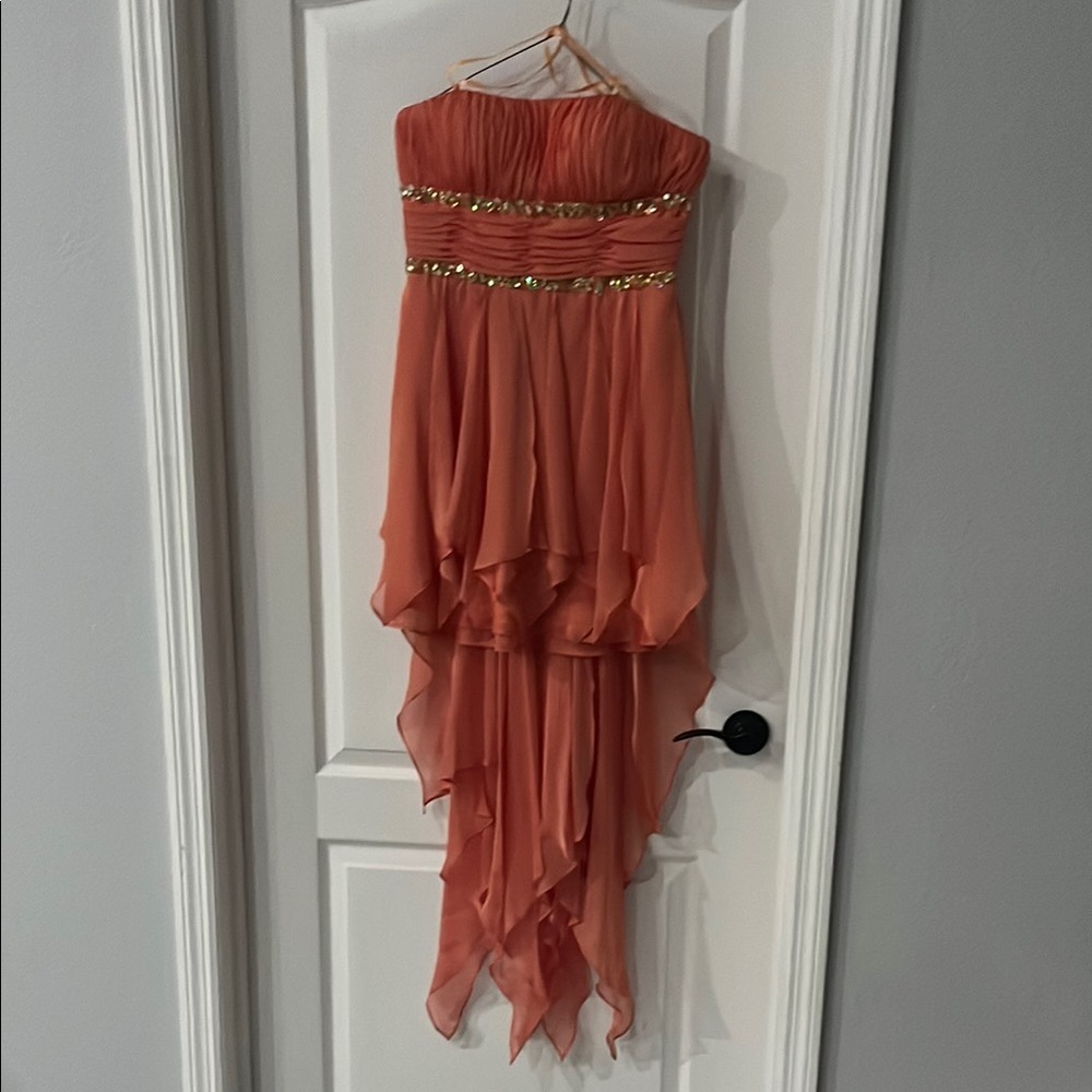 Elegant Coral Strapless Dress with Gold Accents